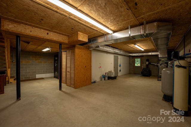 basement with a wood stove