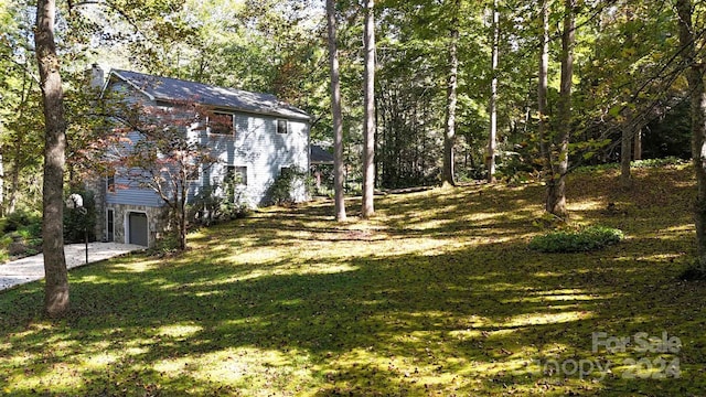 view of yard with a garage