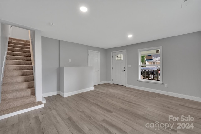 entrance foyer with light hardwood / wood-style floors