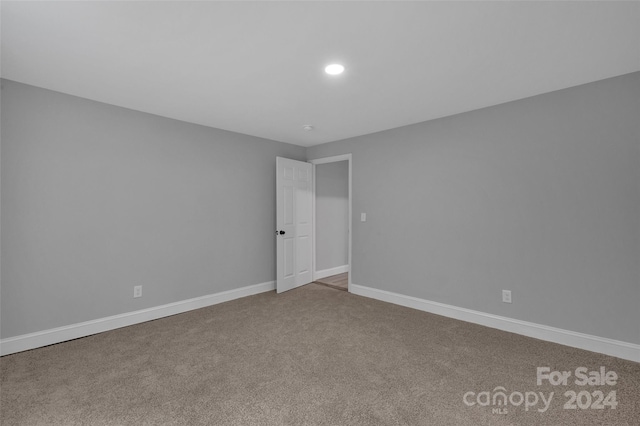 empty room with carpet floors