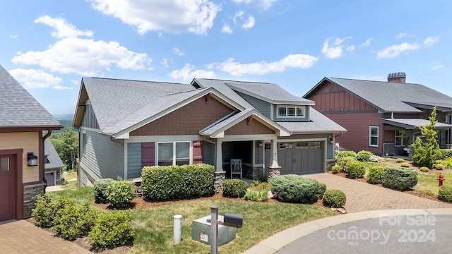 craftsman house with a garage