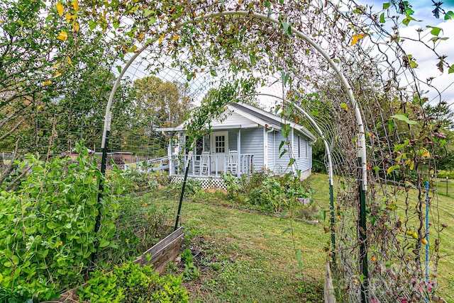 view of yard featuring a porch