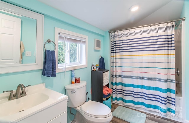 full bathroom with vanity, shower / tub combo with curtain, toilet, and wood-type flooring