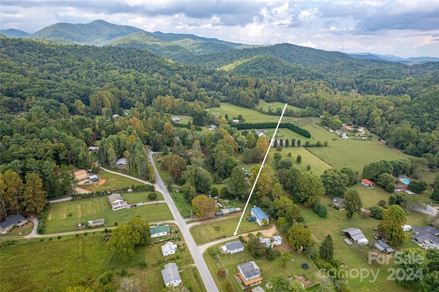 drone / aerial view featuring a mountain view