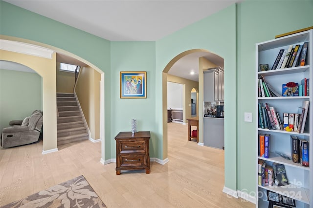 hallway featuring light hardwood / wood-style flooring