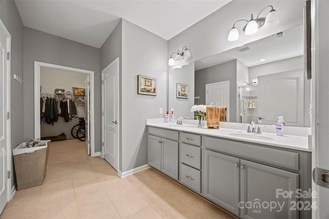 bathroom featuring vanity and tile patterned floors