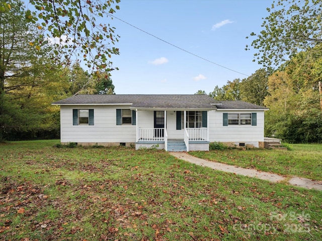 ranch-style house featuring a porch and a front yard