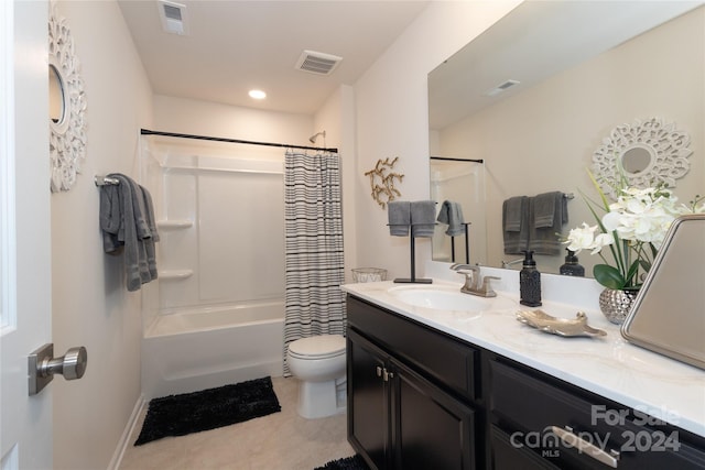 full bathroom featuring tile patterned flooring, vanity, toilet, and shower / bathtub combination with curtain