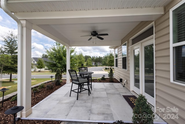 view of patio / terrace featuring ceiling fan