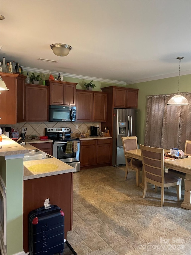 kitchen with ornamental molding, stainless steel appliances, hanging light fixtures, and tasteful backsplash