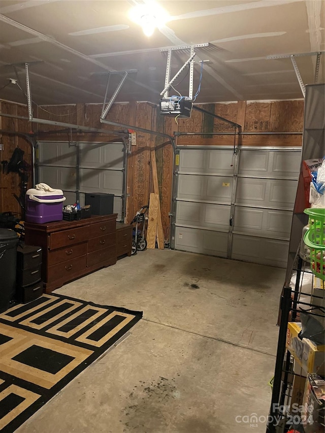 garage featuring a garage door opener