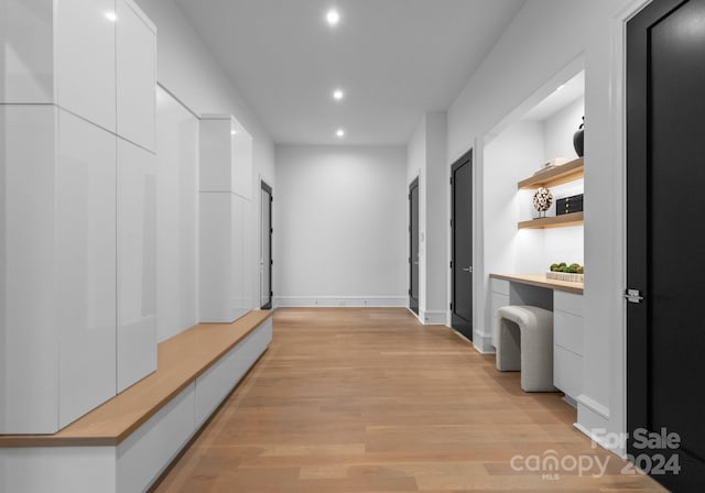 corridor featuring light hardwood / wood-style flooring