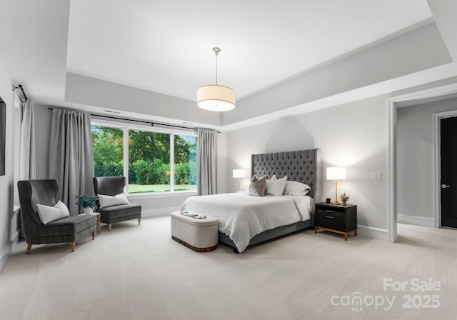 2116 Woodhaven Rd, Charlotte, NC 28211 - bedroom featuring baseboards, a tray ceiling, and light colored carpet