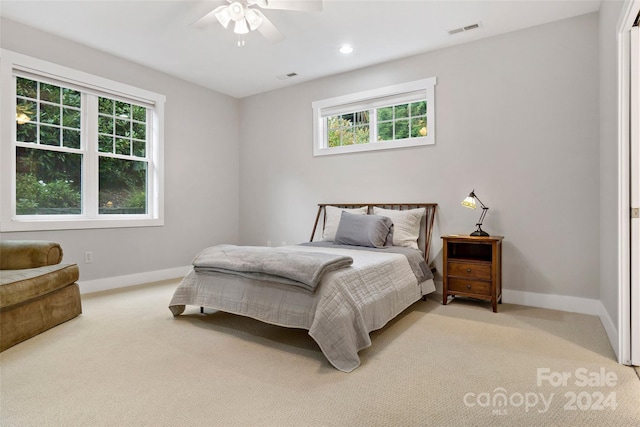 carpeted bedroom with recessed lighting, baseboards, ceiling fan, and visible vents
