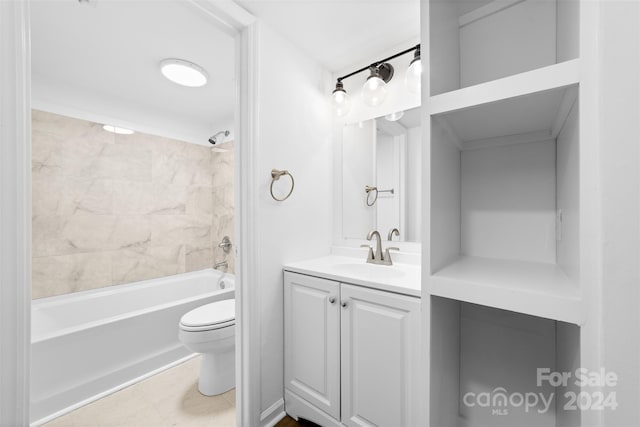 full bathroom with vanity, tiled shower / bath combo, and toilet