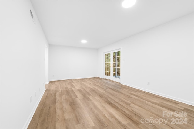 empty room with light wood-type flooring