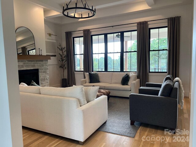 living room with light hardwood / wood-style floors and plenty of natural light