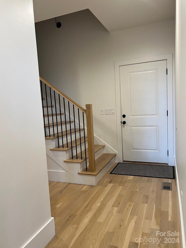 foyer with light hardwood / wood-style flooring