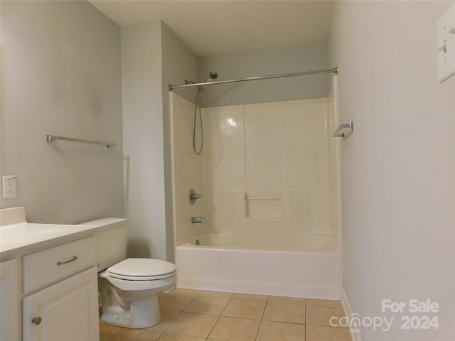 full bathroom featuring shower / tub combination, vanity, toilet, and tile patterned floors