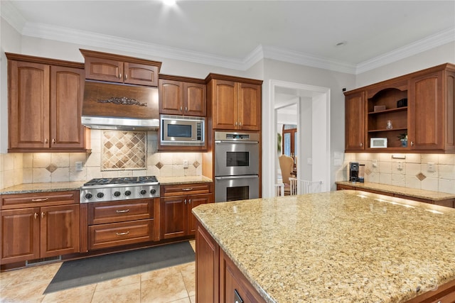 kitchen featuring tasteful backsplash, appliances with stainless steel finishes, open shelves, and light stone countertops