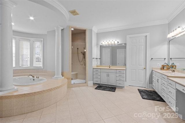 full bathroom featuring crown molding, a stall shower, ornate columns, and a sink