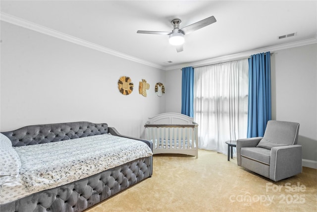 bedroom with visible vents, carpet, and crown molding