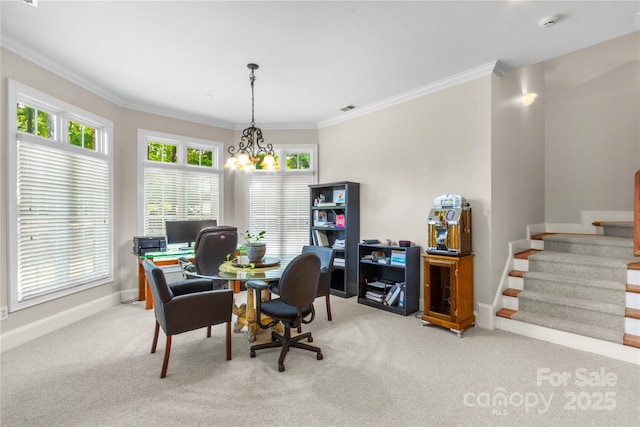 carpeted home office featuring crown molding, visible vents, baseboards, and a chandelier