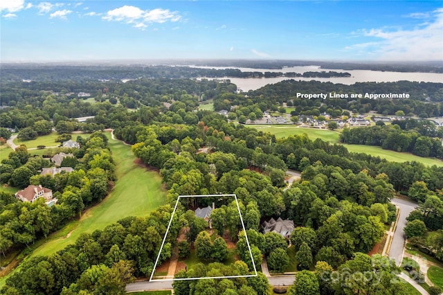 aerial view featuring view of golf course and a water view