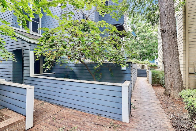 view of home's exterior with a deck