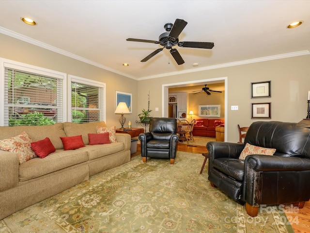 living room featuring crown molding and wood-type flooring