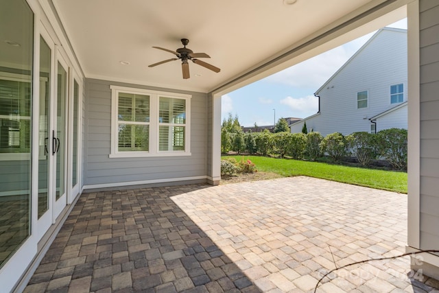 view of patio / terrace featuring ceiling fan