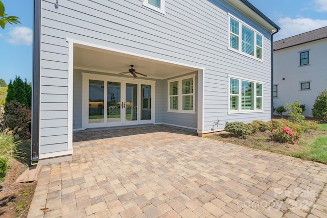 back of house featuring a patio and ceiling fan