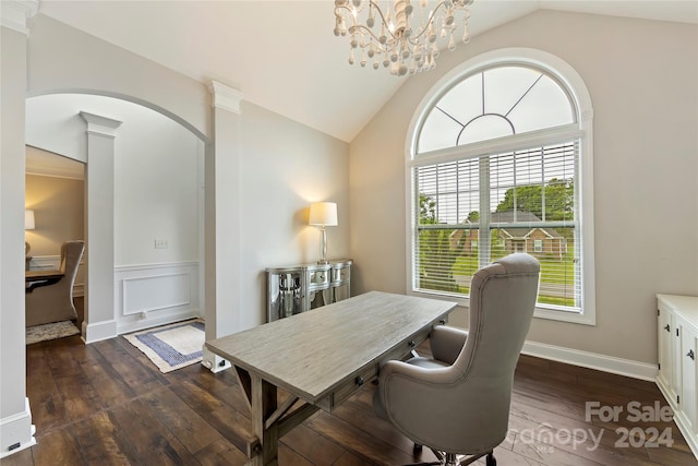 home office featuring decorative columns, vaulted ceiling, dark hardwood / wood-style floors, and plenty of natural light