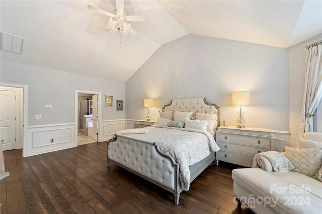 bedroom with ceiling fan, lofted ceiling, dark hardwood / wood-style floors, and ensuite bathroom