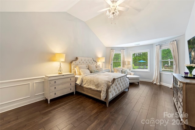 bedroom featuring lofted ceiling, dark hardwood / wood-style floors, and ceiling fan