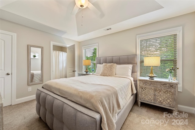 carpeted bedroom featuring ceiling fan