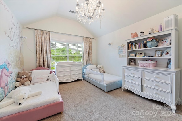 carpeted bedroom featuring lofted ceiling and a chandelier