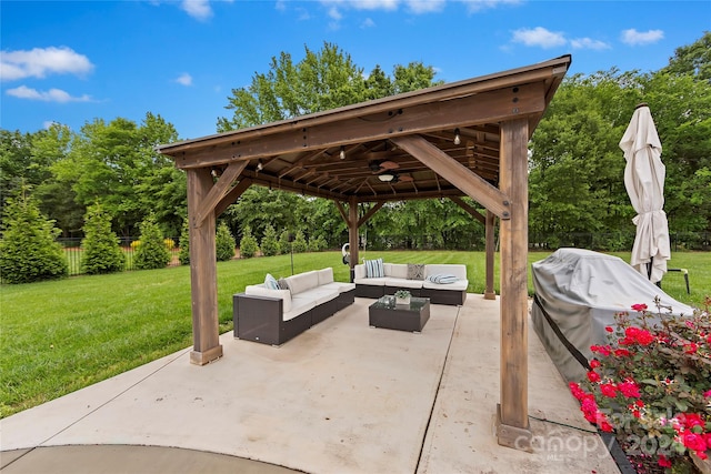 view of patio / terrace featuring area for grilling, a gazebo, an outdoor living space, and ceiling fan