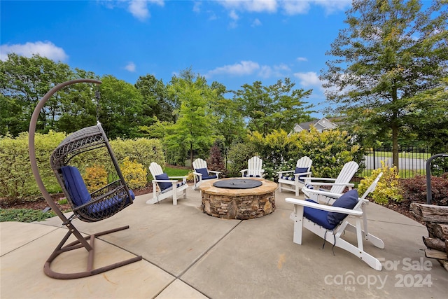 view of patio featuring a fire pit