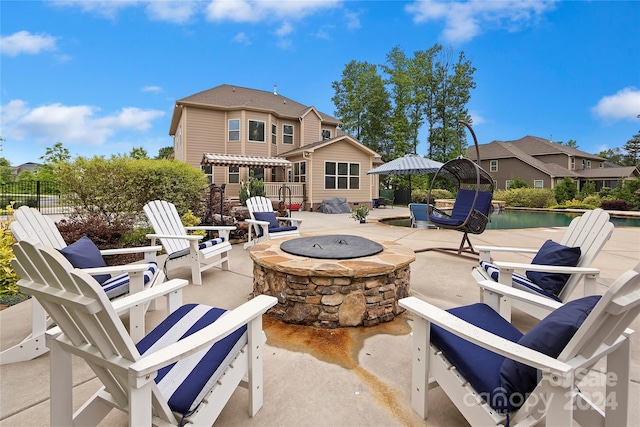 view of patio featuring a fire pit