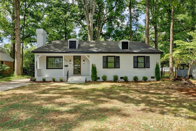 view of front of house featuring a porch and a front yard