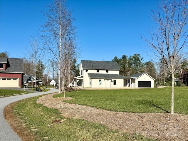 view of side of home with a yard