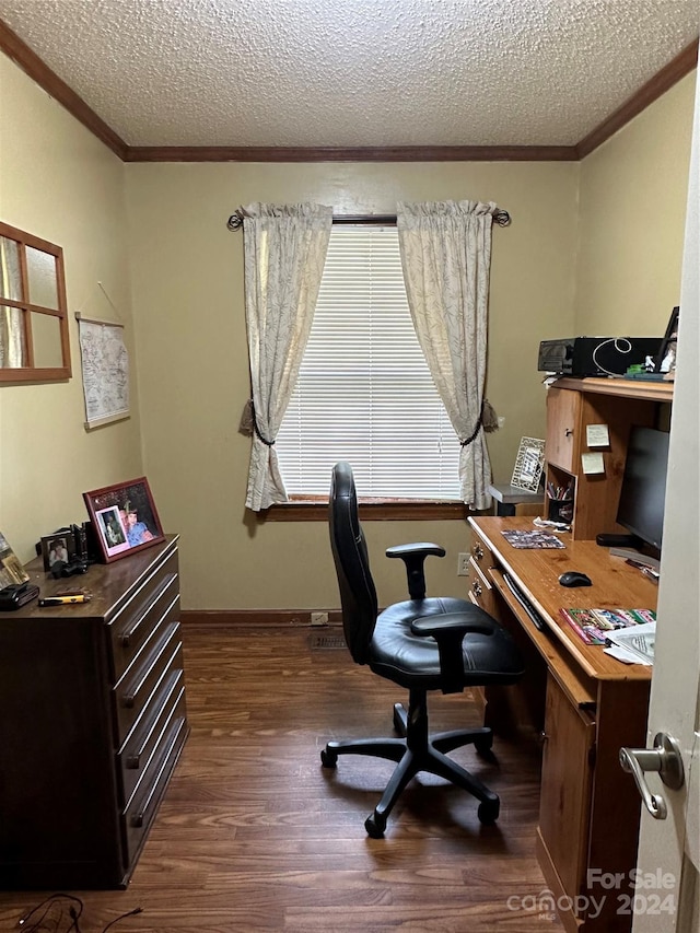 office space with a textured ceiling, crown molding, and dark hardwood / wood-style flooring