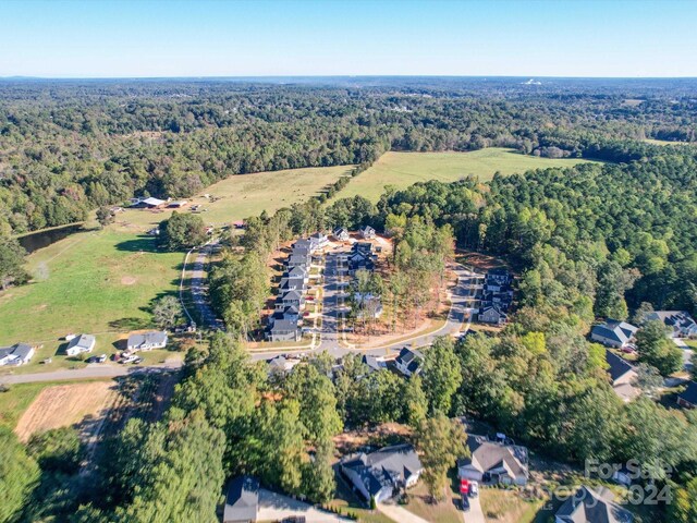 bird's eye view with a view of trees