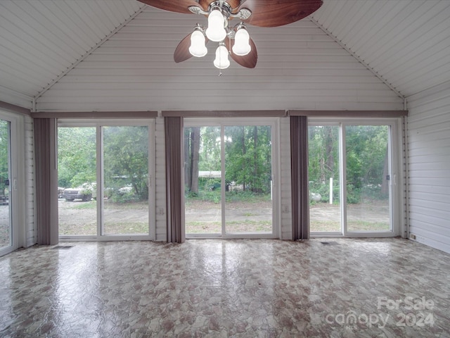 interior space with vaulted ceiling and ceiling fan