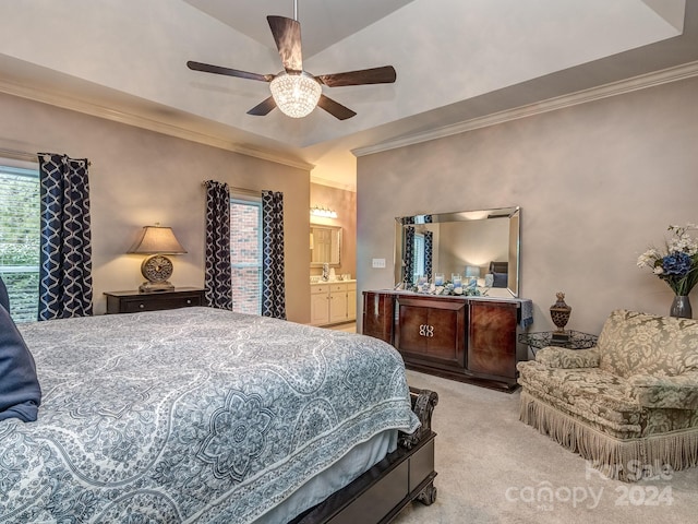 bedroom with ceiling fan, lofted ceiling, connected bathroom, ornamental molding, and light carpet