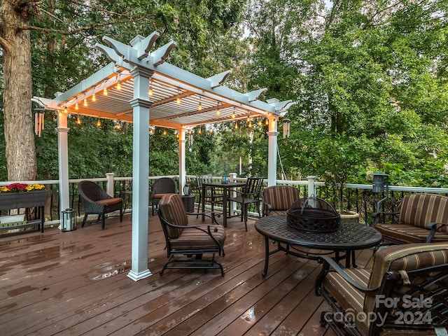 wooden deck with a pergola