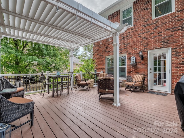 wooden deck with a pergola