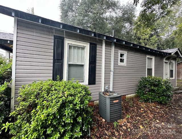 view of property exterior with central air condition unit