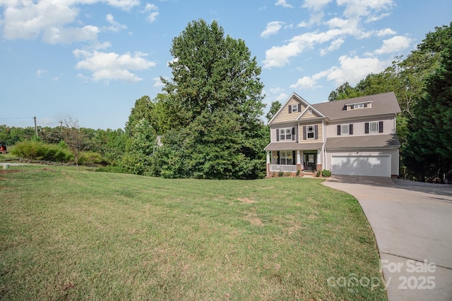 view of front of home with a porch, a garage, and a front yard